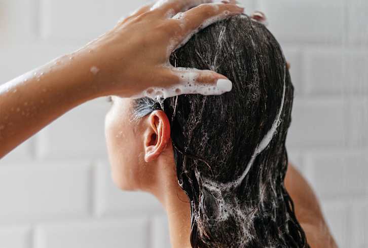 How Often Should You Actually Condition Your Hair? We Asked The Pros